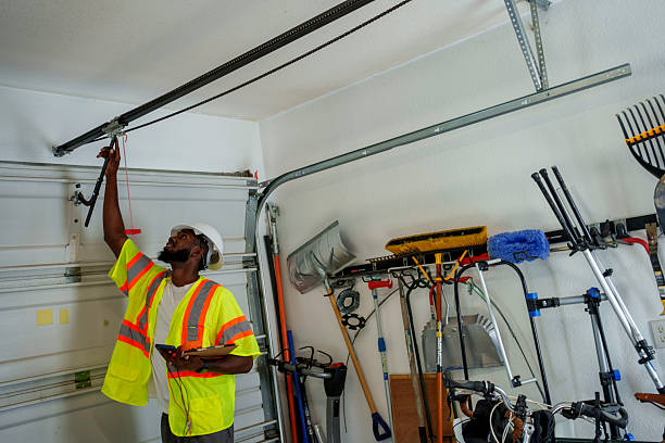 Professional Garage Door Panel Replacement technician working in Sterling, KS