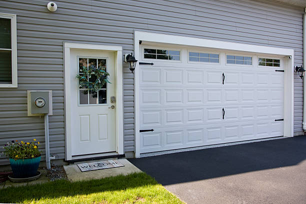24/7 Emergency Garage Door Panel Replacement experts in Sterling, KS
